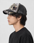 Model wearing the dark gray shark patch cap, side profile