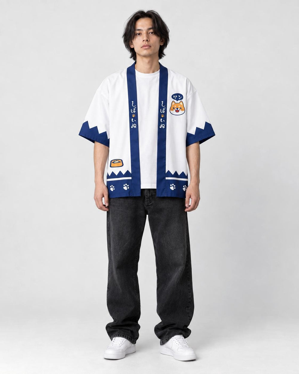 Model wearing the white shiba haori open over a white tee, front view