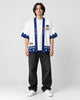 Model wearing the white shiba haori open over a white tee, front view