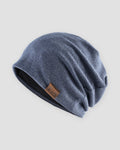 Blue slouch beanie with a small tan F&S patch on the side