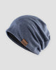 Blue slouch beanie with a small tan F&S patch on the side