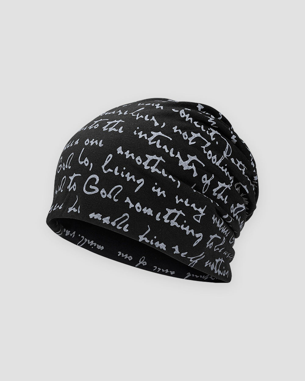 Black slouchy beanie printed all over with white handwritten cursive script