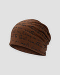 Brown slouchy beanie printed all over with black handwritten cursive script