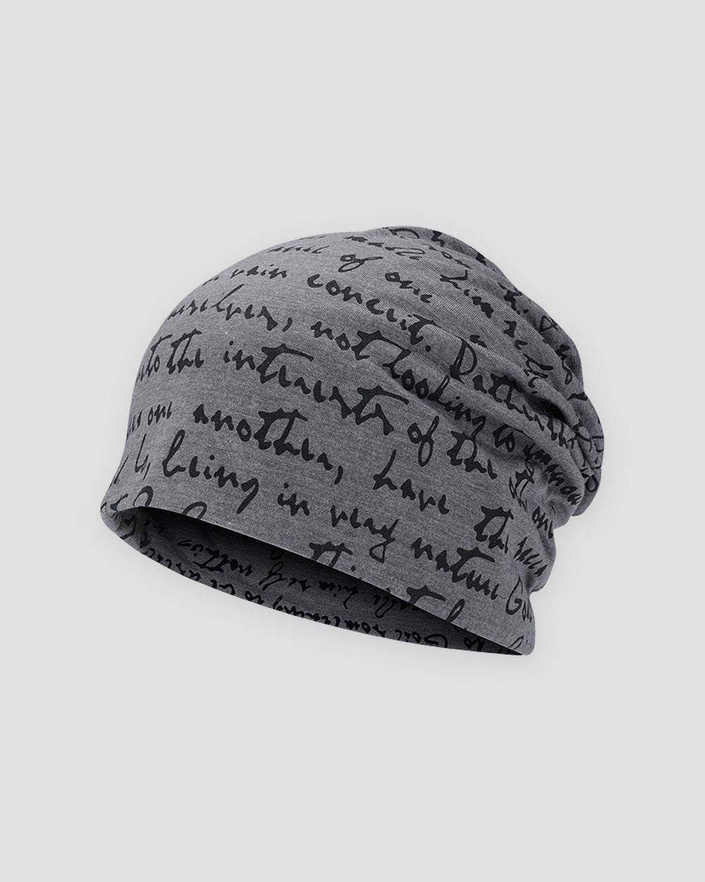 Dark gray slouchy beanie printed all over with black handwritten cursive script