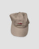 Khaki baseball cap with a small red whale embroidered at the front center