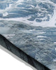 Close-up of the snowy mountain print and stitched hem