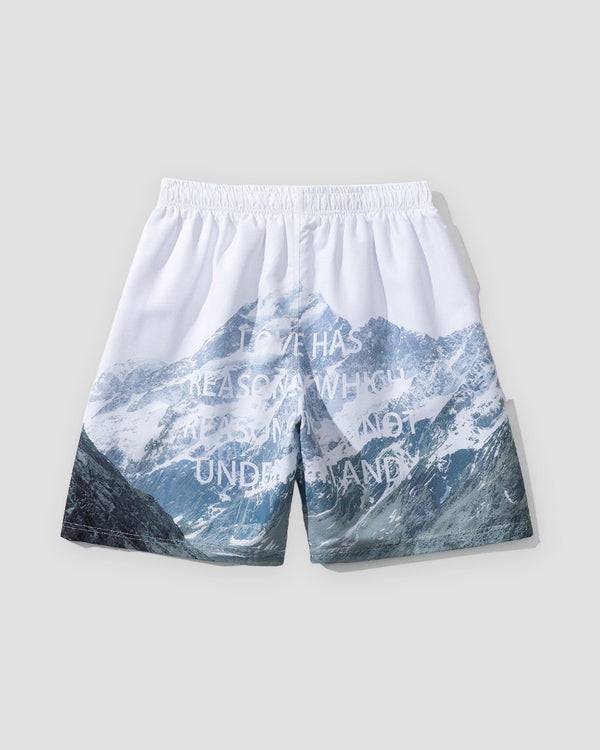 Back of the snowy mountain shorts with white lettering across the printed peaks
