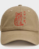 Front view of the khaki cap with the red line-art cat and katakana on the crown