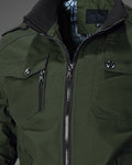 Close-up of the ribbed stand collar, epaulette, chest flap pocket and zip on the army green jacket