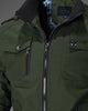 Close-up of the ribbed stand collar, epaulette, chest flap pocket and zip on the army green jacket