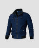Blue cotton field jacket with a black ribbed collar, cuffs and hem