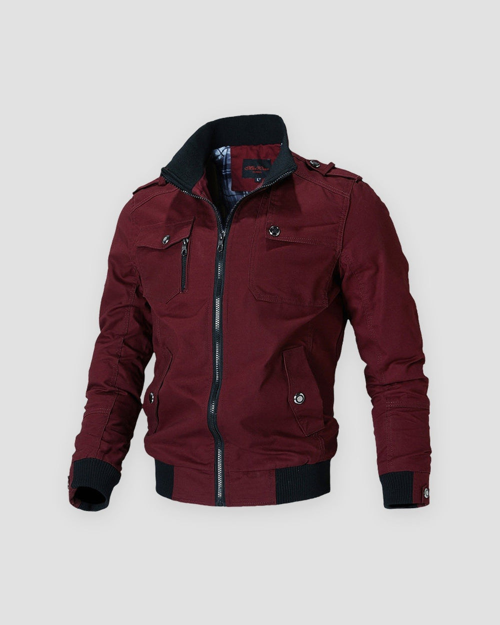 Red cotton field jacket with a black ribbed collar, cuffs and hem