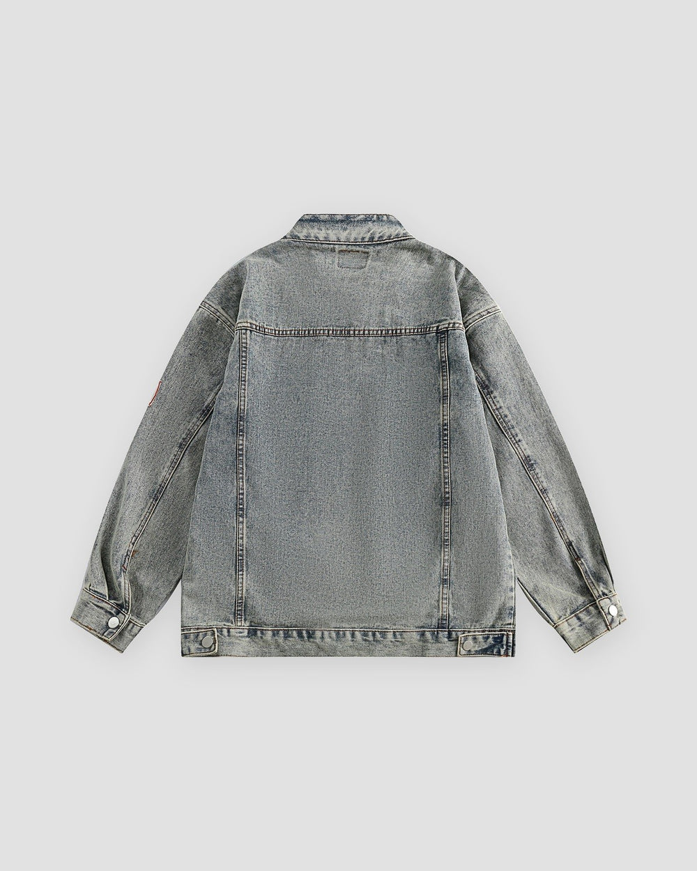 Gray-blue patch denim jacket, back view
