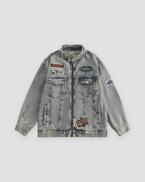 Gray-blue patch denim jacket, front view, zip front and embroidered patches