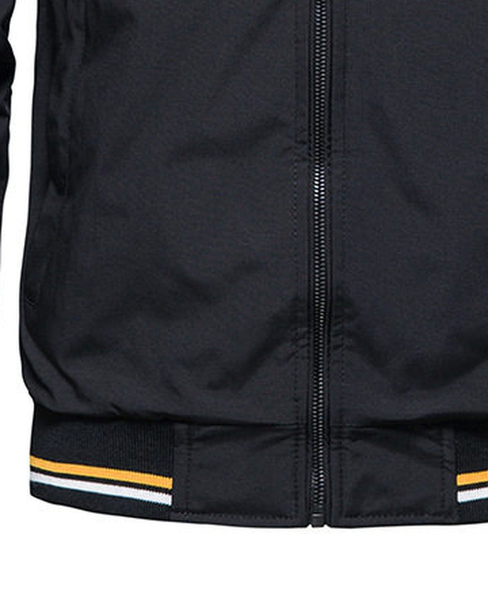 Close-up of the striped rib hem on the black jacket