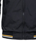 Close-up of the striped rib hem on the black jacket