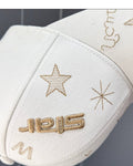 Close-up of the raised star lettering and a small W embroidered on the white cap