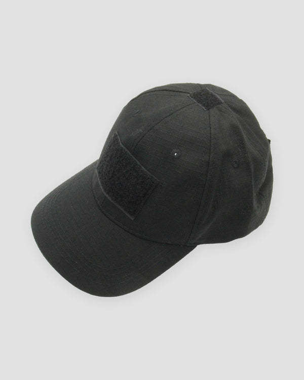 Black ripstop baseball cap with a large hook-and-loop panel on the front and a smaller one on the crown