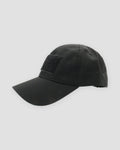 Black ripstop baseball cap from the side with a long curved brim and a front hook-and-loop panel