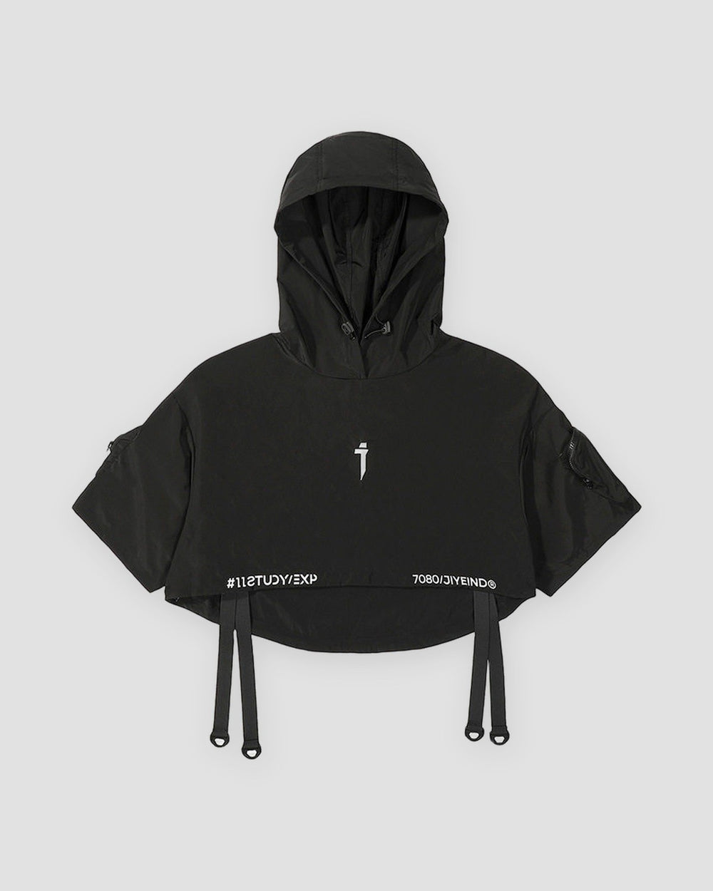 Black cropped hooded poncho top with ring straps at the hem, front view