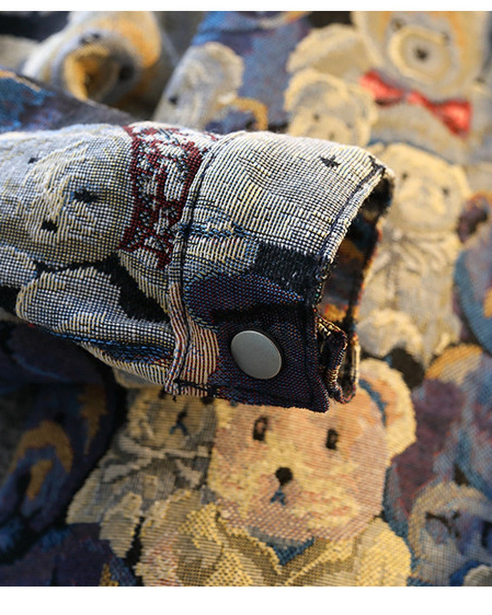 Close-up of the buttoned cuff in the teddy bear weave