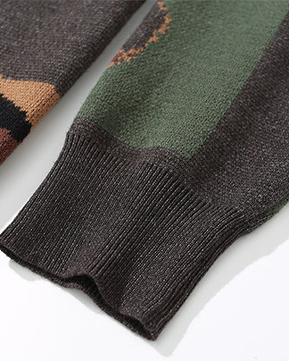 Close-up of the knitted sleeve pattern and ribbed cuff