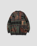 Charcoal teddy bear sweater, back view of the knitted patchwork