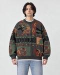 Model wearing the charcoal teddy bear jacquard sweater with jeans, front view