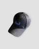 Black textured baseball cap with royal-blue cursive best embroidery on the front and a curved brim