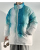 Blue-green tie-dye puffer jacket with horizontal channels, front view