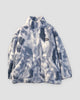 Blue and white tie-dye plush jacket with a stand collar, front zip and two large pockets, laid flat