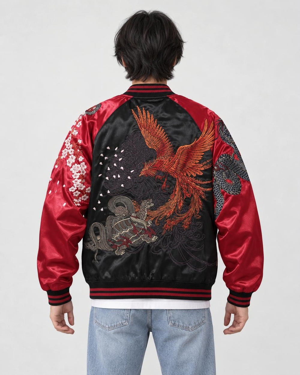 Model wearing the red tiger and dragon sukajan, back view of the phoenix embroidery