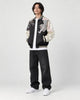 Model wearing the cream-sleeved tiger and dragon sukajan, front view