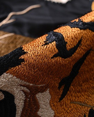 Close-up of the tiger's striped embroidery