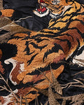 Close-up of the embroidered tiger among bamboo