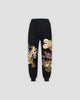 Black tiger dragon embroidered joggers, front view