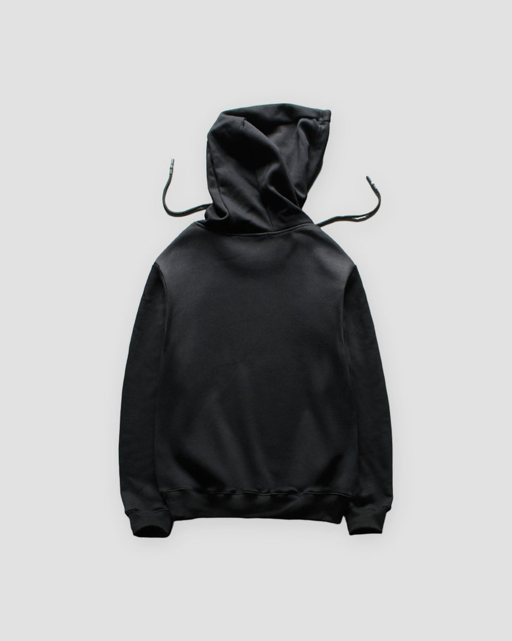 Back view of the black hoodie with its hood and drawstring