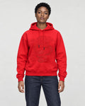 Model wearing the red dragon embroidered hoodie with dark jeans, front view