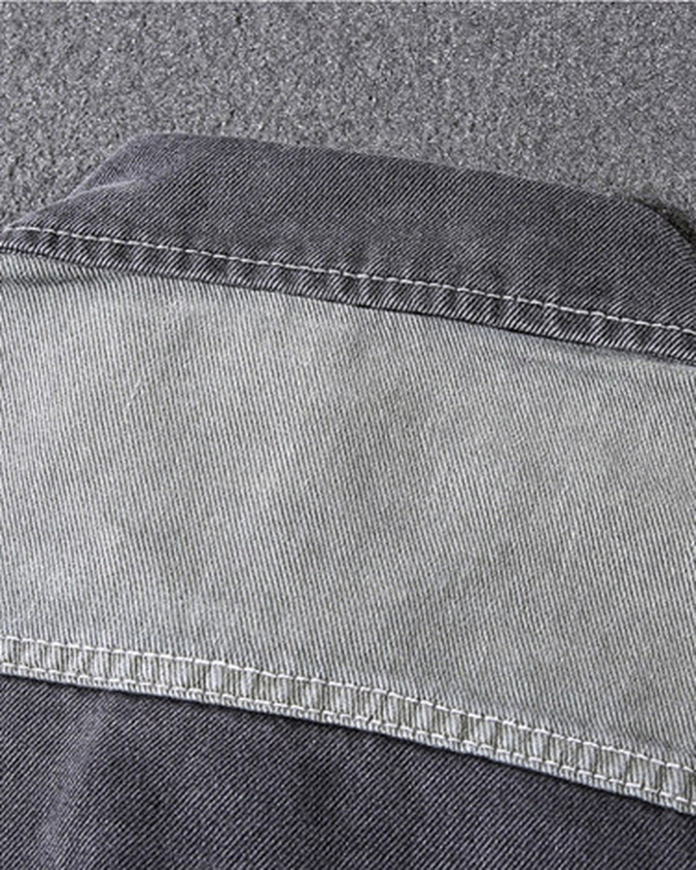 Close-up of the light gray back yoke seam