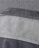 Close-up of the light gray back yoke seam