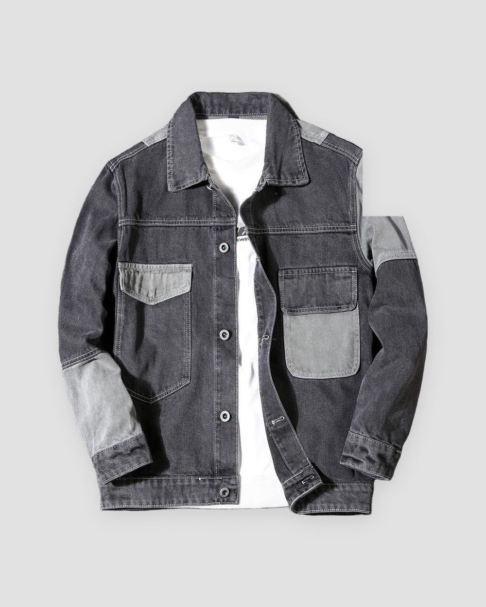 Dark gray patchwork denim jacket with light gray pockets and sleeve panels, front view