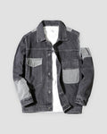 Dark gray patchwork denim jacket with light gray pockets and sleeve panels, front view