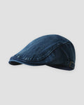 Dark blue washed denim flat cap, side view