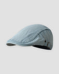 Light blue washed denim flat cap, side view
