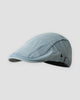 Light blue washed denim flat cap, side view