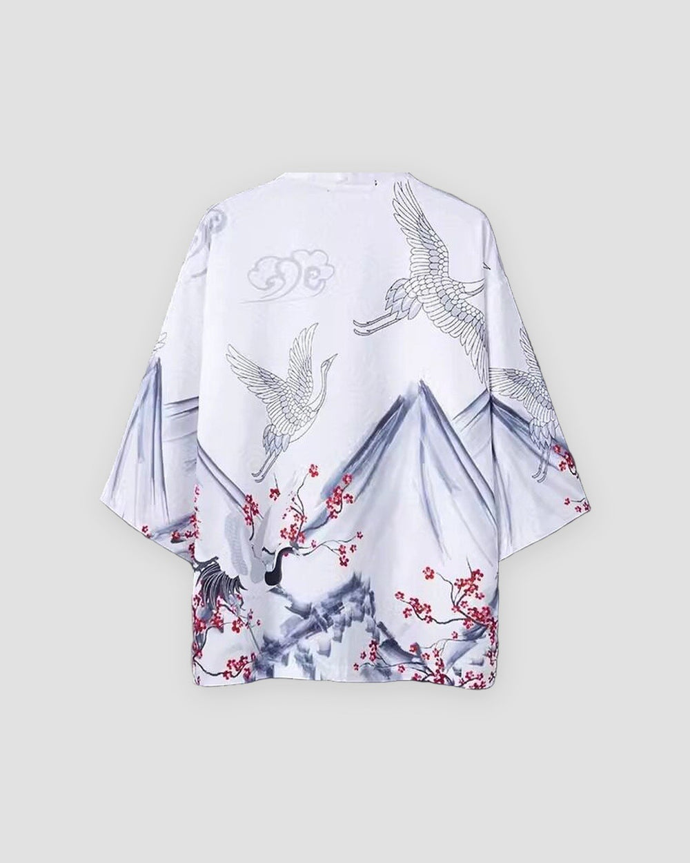 White haori jacket on a hanger, back view with gray mountains, white cranes and red plum blossoms along the hem