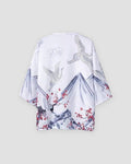 White haori jacket on a hanger, back view with gray mountains, white cranes and red plum blossoms along the hem