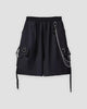 Black cargo shorts with a silver chain, a ring at the waistband, two buckled pockets and long side straps