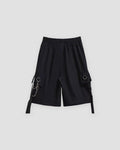 Black cargo shorts from the side with a ring, a short chain and a long hanging strap