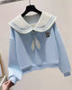 Light blue sailor-collar sweatshirt on a hanger, showing the puffed sleeve and the ribbed cuff